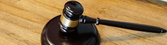 Gravel on table with paper files above