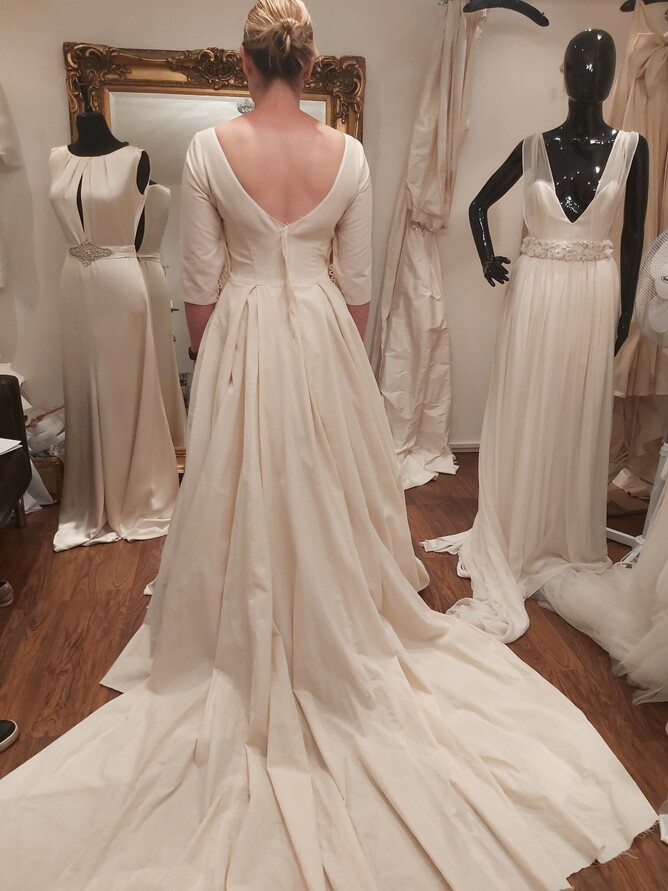 Real bride during her calico fitting for her wedding dress, creative wedding dress process 