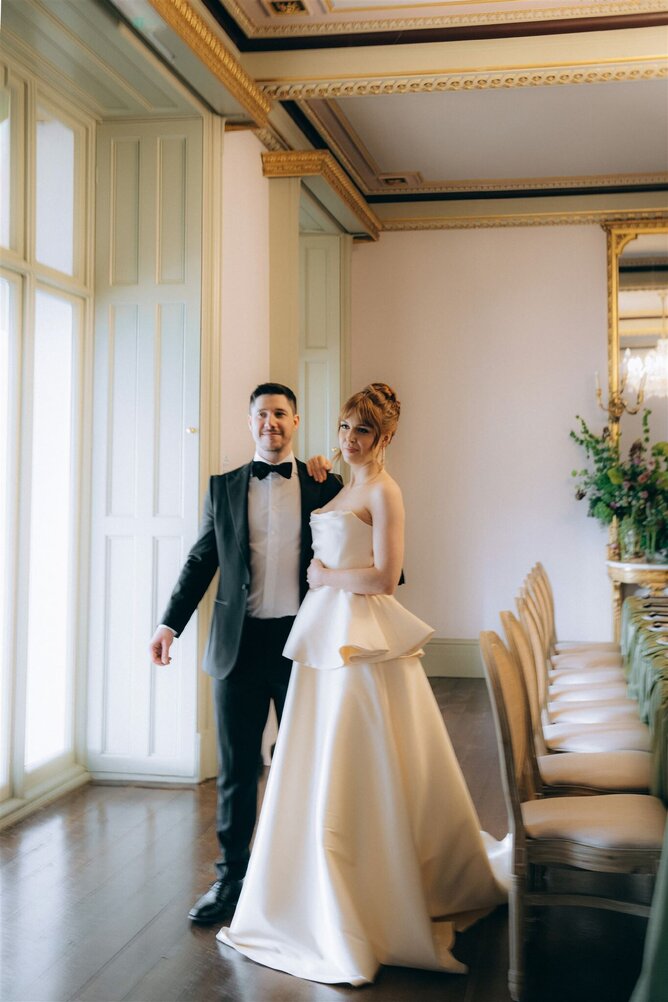 Bride wearing a bespoke Kate Edmondson wedding dress on her wedding day at Garthmyl Hall