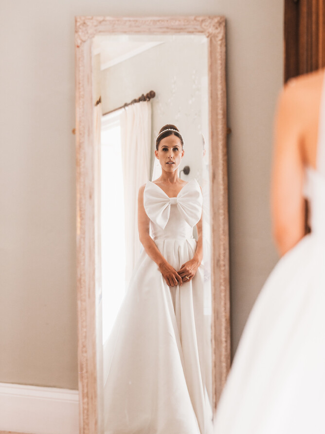 Our bride wearing bespoke wedding dress on her wedding day, bespoke wedding dresses London, bespoke wedding dress designer London, 