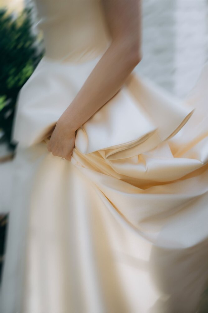 Bride in custom wedding dress designed for elegance and movement