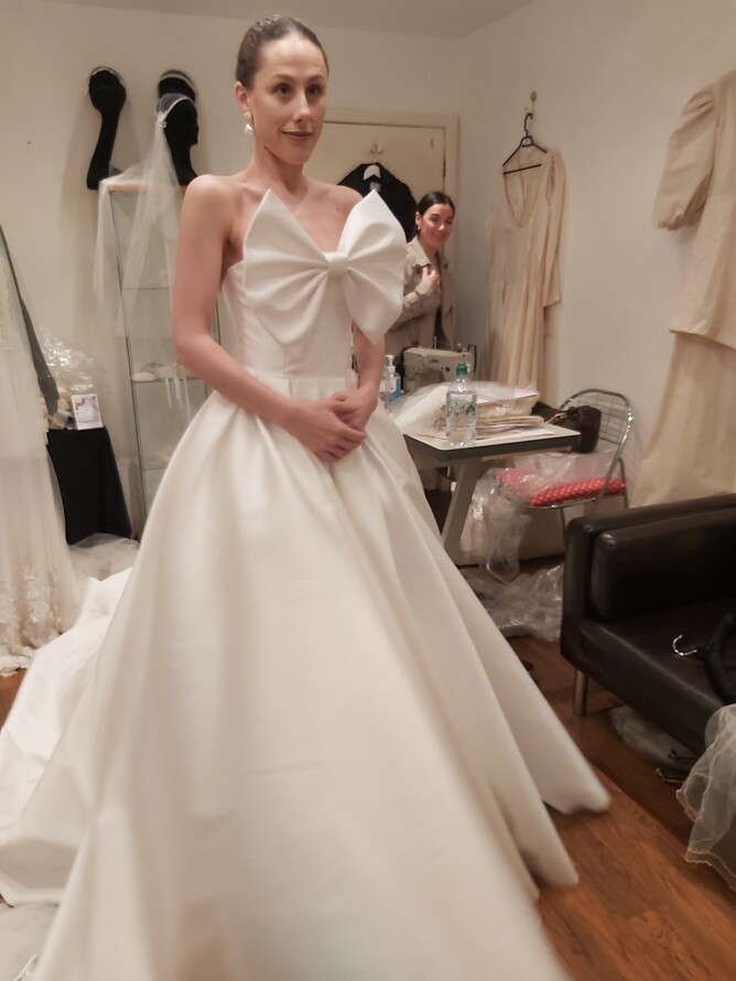 Our bride at her shell fitting, wedding dressmaking process, Custom made wedding dress, bespoke wedding dress designer, Wedding dressmaker London, Custom wedding dresses near me