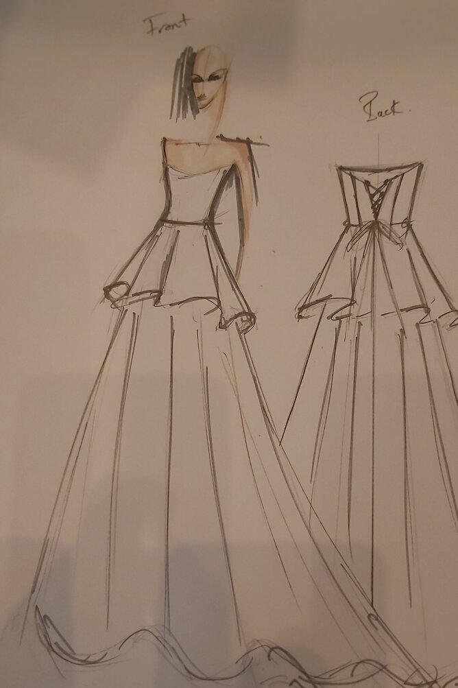 Hand-drawn bespoke wedding dress sketch beside couture gown in progress