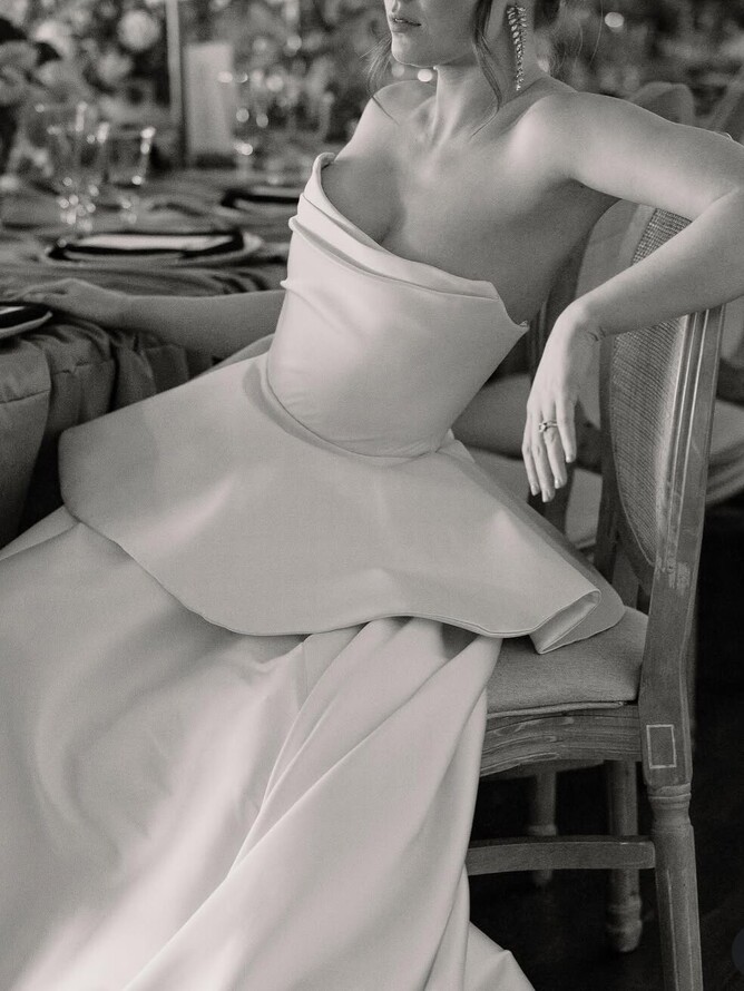 Bride wearing a bespoke Kate Edmondson wedding dress on her wedding day at Garthmyl Hall