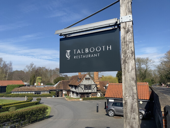 talbooth hanging signage infront of building made by esign professional signs