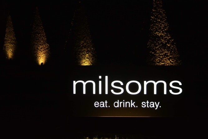 image of illuminated signage in the dark made by esign professional signs