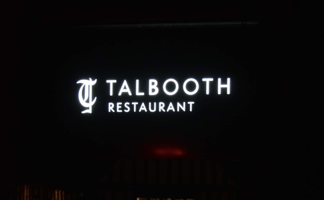 illuminated signage for the Talbooth restaurant in the dark by Esign
