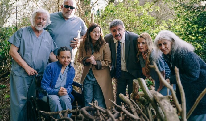 Main cast on location with 