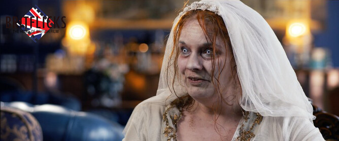 Emma Spurgin Hussey as Aunt Alexandra in zombie movie Hobbes House