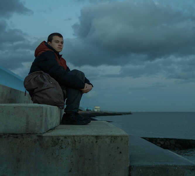 Conrad Khan as Tyler in COUNTY LINES poster image (dir. Henry Blake) 