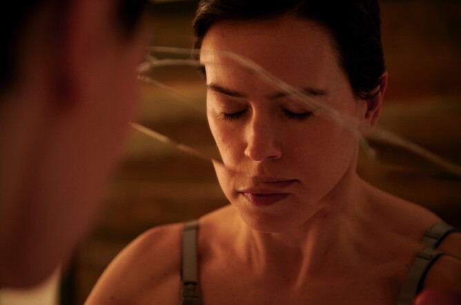 Daisy Ridley in 'MAGPIE', a psychological thriller directed by Sam Yates, portraying a woman on the edge in a dark, tension-filled neo-noir setting.