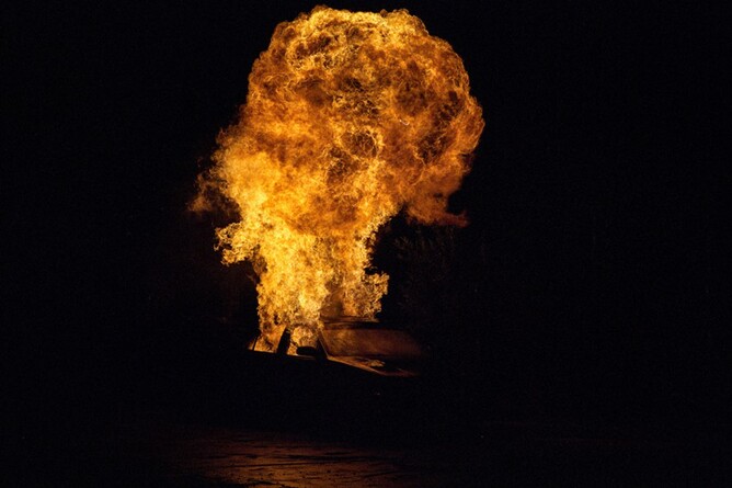 Car explodes in Larry Smith's Asian mobster movies Trafficker.