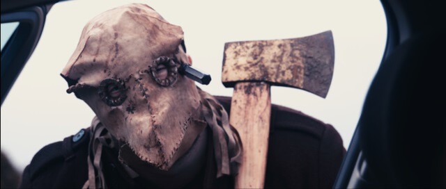 HARVEST OF THE DEAD - HALLOWEEN NIGHT – Masked man with Axe