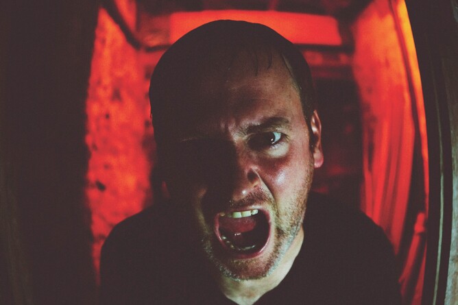 Official poster for BLACK DARUMA, a POV horror film about a Japanese Daruma doll that brings chaos and dark humor, now streaming on Amazon Prime.