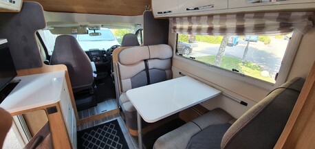 Front lounge, converts to a queen bed