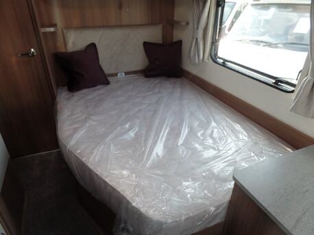 large fixed frence bed, 6'11'' by 4' 3''