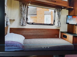 single bed 5'0'' by 2'6'' with own tv,dvd