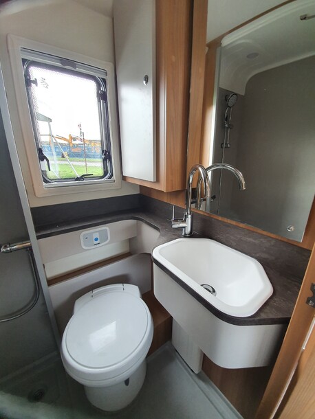 separate bathroom and toilet, with window and blind