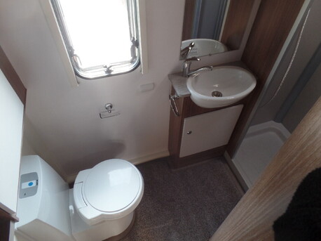 separate bathroom and shower,                        with glass door