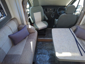 Front lounge with movable table