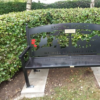 A laser cut memorial bench bolted down to slabs with anti tamper fittings.