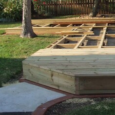 Softwood Decking boards now being laid and fixed.