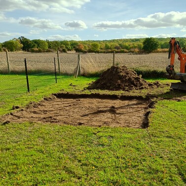 Image shows excavated base area for the new castor ring. Approximately 180mm of soil removed.
