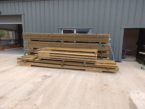 A pile of timber components for the installation of Acoustic barrier fence.