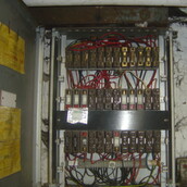 Asbestos containing fuse guards
