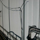 Asbestos coating to metal corrugated sheets (galbestos)