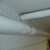 Asbestos insulation in good condition on pipe work