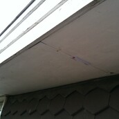 Asbestos cement soffit boards