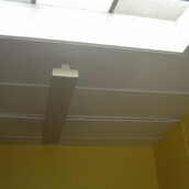 Asbestos cement containing strammit board