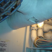 Asbestos matting to ductwork