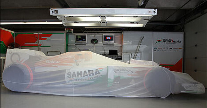 Cars are covered and watched by CCTV overnight in parc fermé. CREDIT: Sahara Force India